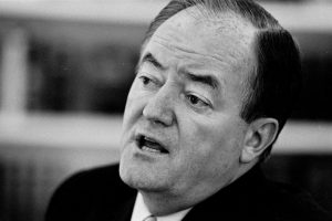 A black and white image shows Hubert Humphrey.