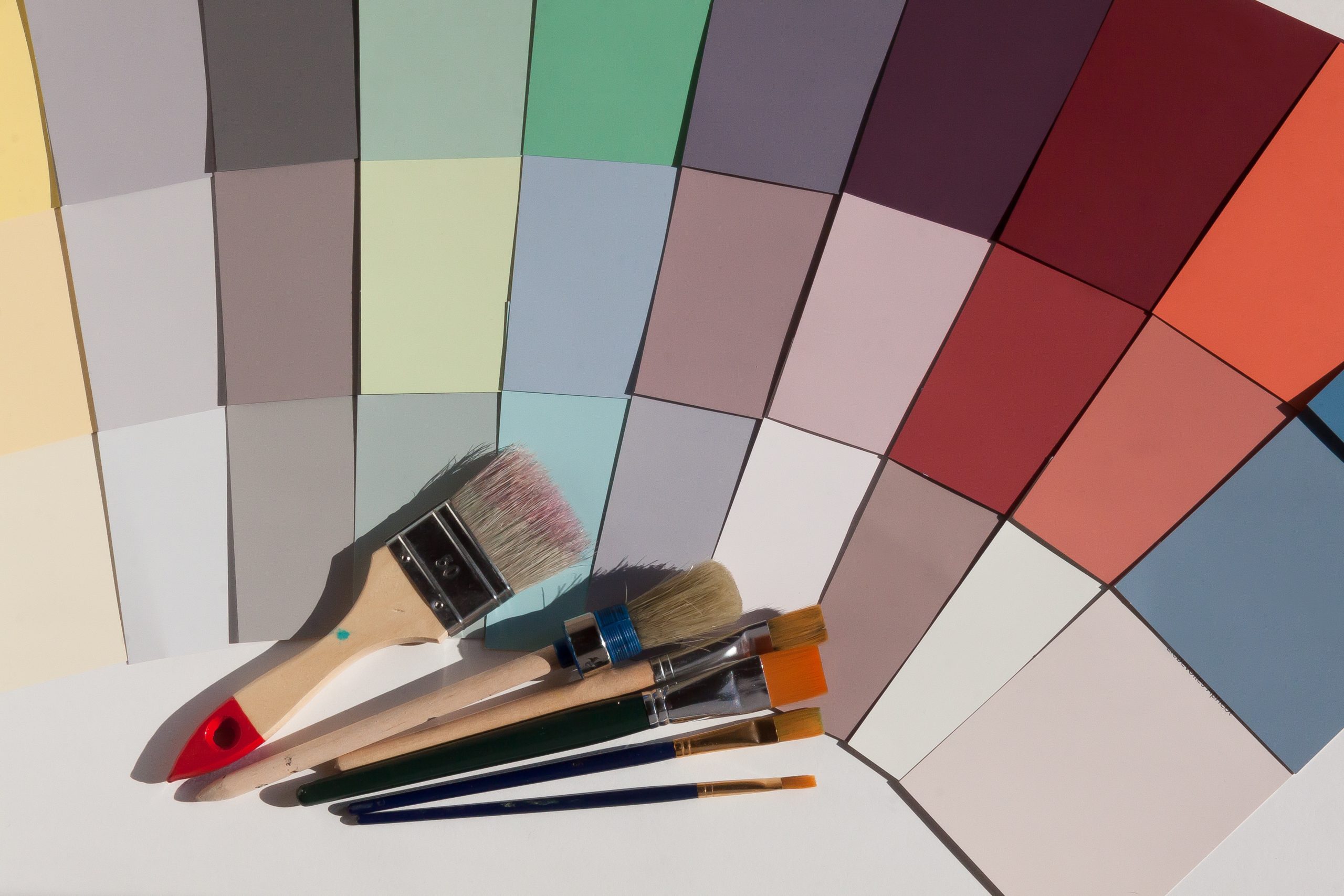 Paint color pallet with a set of paint brushes.