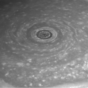 Like a giant eye for the giant planet, Saturn's great vortex at its north pole appears to stare back at Cassini as Cassini stares at it. The image was taken with the Cassini spacecraft narrow-angle camera on April 2, 2014, using a combination of spectral filters which preferentially admit wavelengths of near-infrared light centered at 748 nanometers.