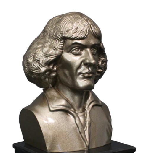 The image appears to be a bust of Nicolaus Copernicus, the Renaissance mathematician and astronomer. Copernicus is renowned for his heliocentric model of the solar system, which posited that the Sun, rather than the Earth, was at the center of the universe. This revolutionary idea challenged the geocentric view prevailing at the time. Copernicus's work laid the foundation for modern astronomy and had a profound impact on our understanding of the cosmos.