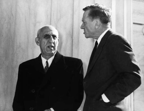 Image ofMohammad Mossadegh Prime Minister, Iran, 1953, while visiting the Supreme Court in Washington D.C., Prime Minister ​ Mohammed Mossadegh of Iran (left) chatted with Associate Justice William O. Douglas. Harry S. Trum. C.C.0, via Wikimedia