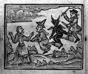 Witches flying on broomsticks