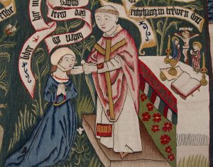 Medieval tapestry of a priest giving a woman communion wafer