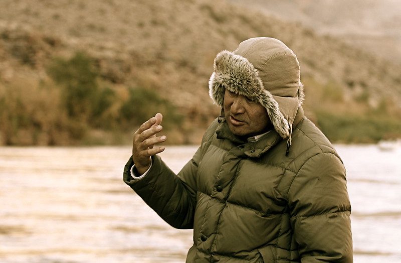 Man gesturing while telling story