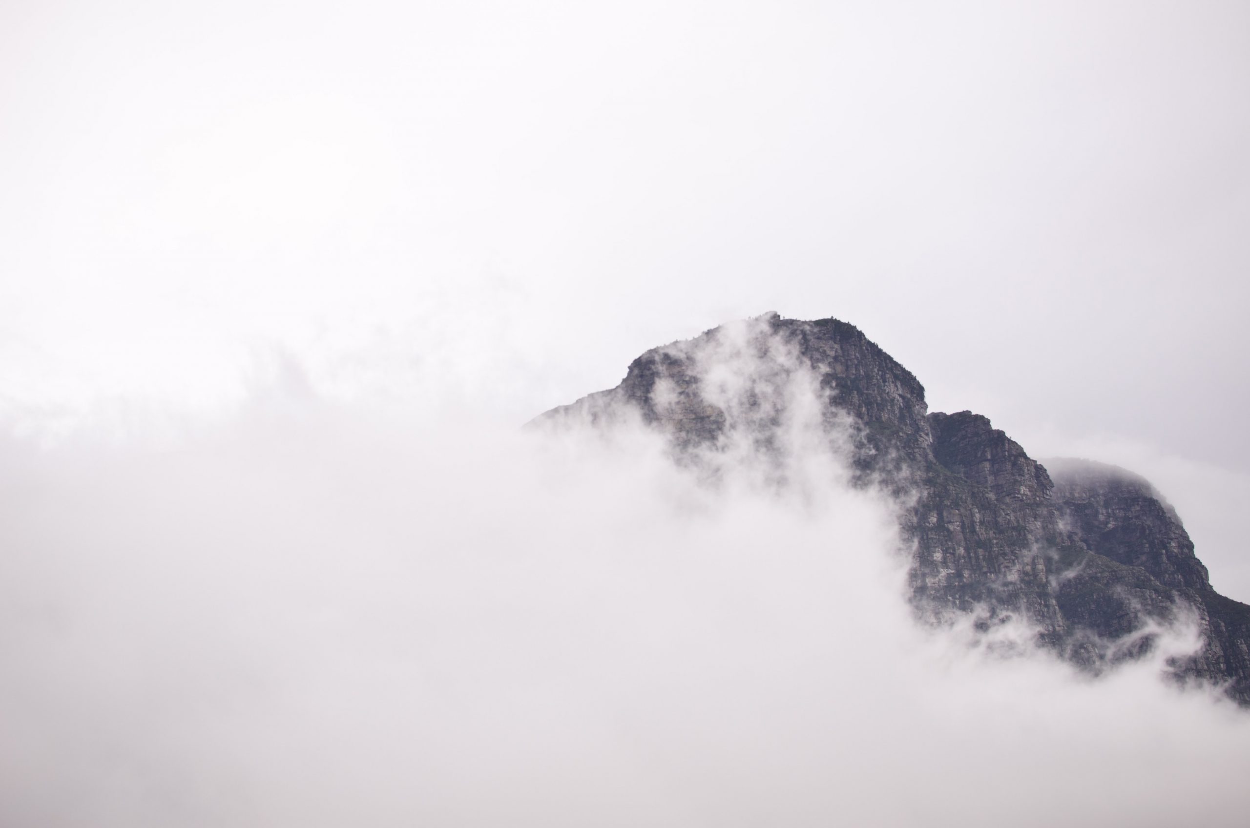 Mountain range above clouds